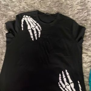 Halloween skeleton hands purposely ripped shirt
